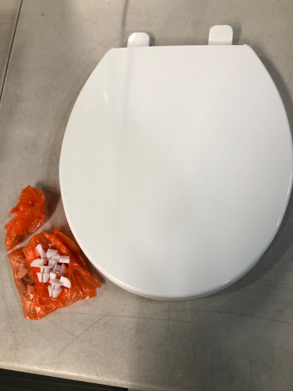 Photo 2 of *NEW* Kohler 4775-0 Brevia Round Toilet Seat with Grip Tight Bumpers, Release, Quick Attach Hardware, Color Matched Hinges, White Round White