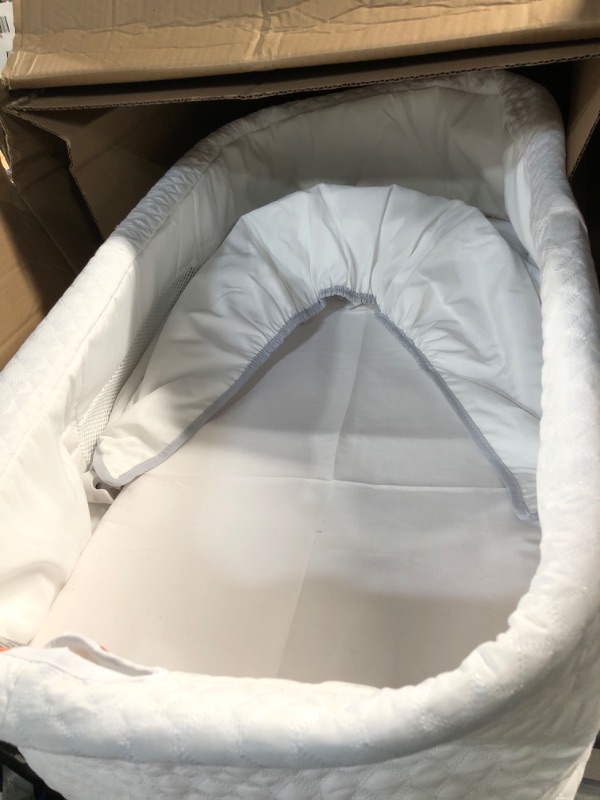 Photo 3 of Delta Children Silent Auto Gliding Elite Bassinet, Odyssey, One Size Bassinet White