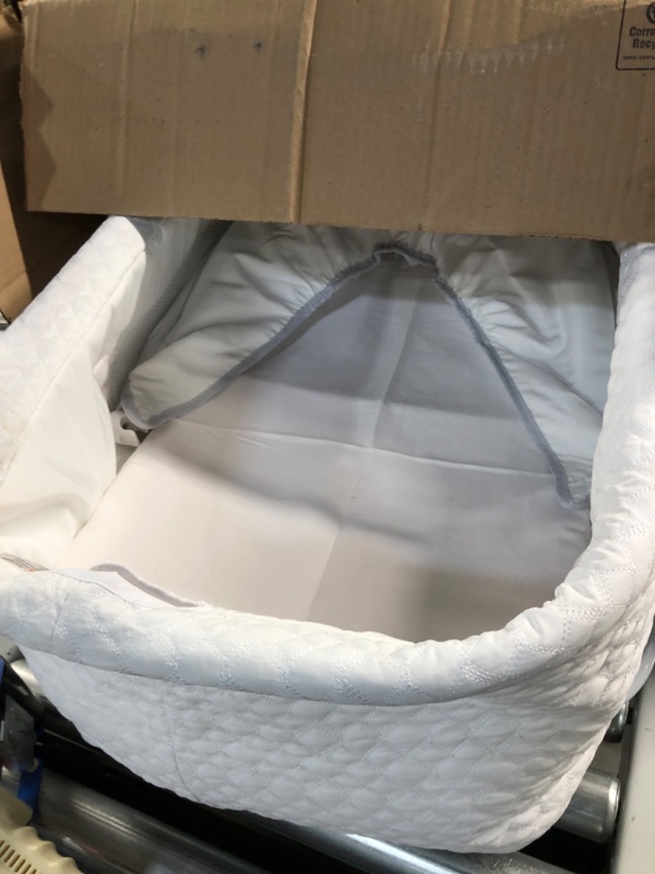 Photo 2 of Delta Children Silent Auto Gliding Elite Bassinet, Odyssey, One Size Bassinet White