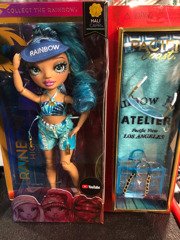 Photo 2 of *NEW* Rainbow High Pacific Coast Hali Capri (Blue) Fashion Doll with Pool Accessories playset, and Interchangeable Legs. 