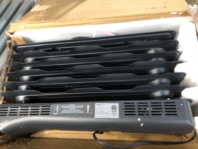 Photo 2 of Amazon Basics Portable Radiator Heater