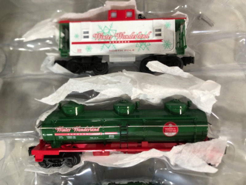 Photo 2 of Lionel Winter Wonderland LionChief 0-8-0 Set with Bluetooth Capability, Electric O Gauge Train Set with Remote