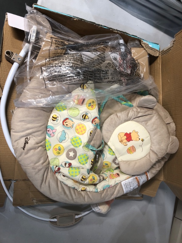 Photo 3 of Bright Starts Winnie the Pooh Dots & Hunny Pots Baby Bouncer with Vibrating Infant Seat, Music & 3 Playtime Toys, 23x19x23 Inch