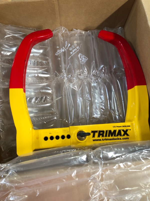 Photo 2 of Trimax TCL75 Deluxe Universal Wheel Chock Lock-Yellow/Red