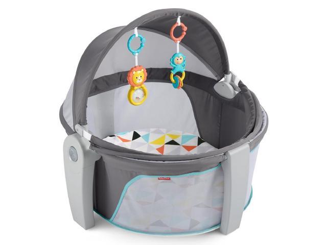 Photo 1 of Fisher-Price Portable Bassinet and Travel-Play Area with Baby Toys