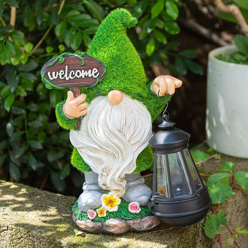 Photo 1 of **NEW/DAMAGED** Solar Garden Statue Outdoor Decor Garden GNOME