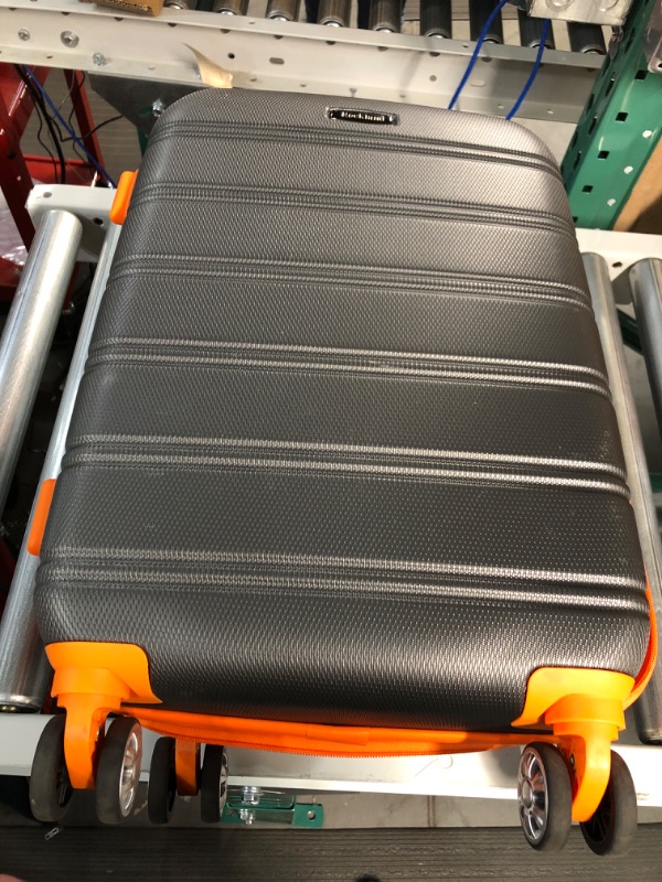 Photo 2 of (USED-Minor damage) Rockland Melbourne Hardside Expandable Spinner Wheel Luggage, Charcoal, 3-PIECE SET 