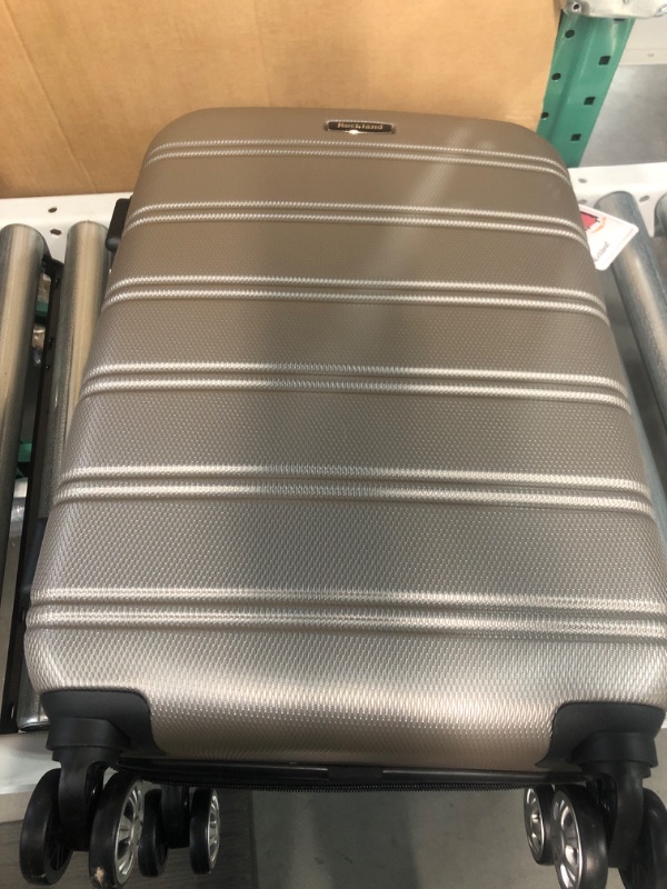 Photo 2 of (USED) Rockland Melbourne Hardside Expandable Spinner Wheel Luggage, Silver, 3-Piece Set (20/24/28)