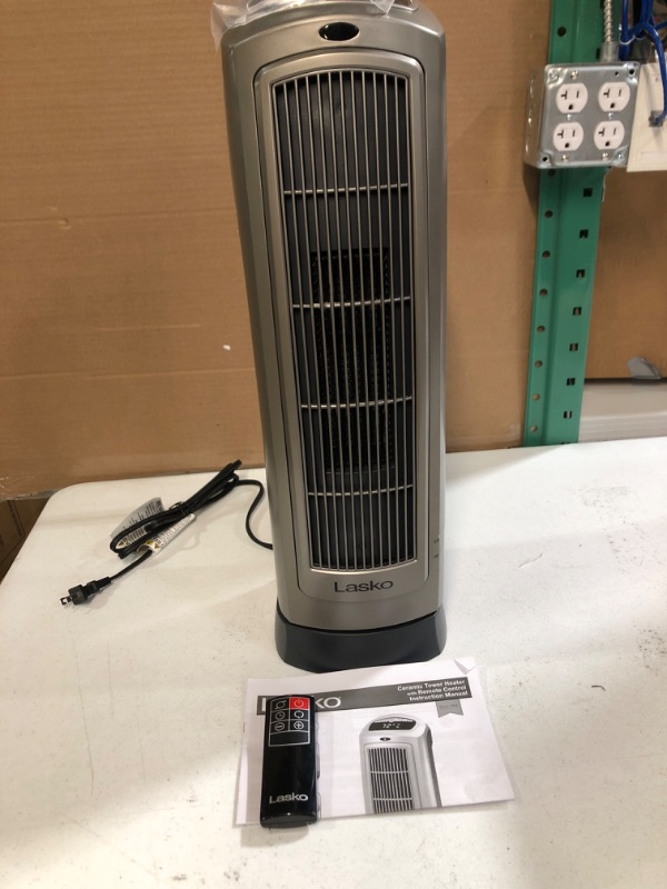 Photo 1 of Lasko Oscillating Digital Ceramic Tower Heater for Home with Adjustable Thermostat, Timer and Remote Control