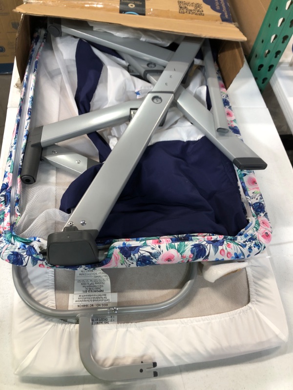 Photo 2 of Dream On Me Flora Baby Bassinet in Floral Bloom, Lightweight and Portable Travel Bassinet with Carry Bag, Five Adjustable Height Position, Mattress Pad Included