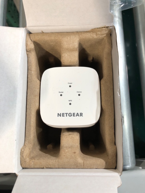 Photo 2 of NETGEAR WiFi Range Extender EX2800 - Coverage up to 1200 sq.ft. and 20 Devices ?5.98 x 4.25 x 3.82 inches