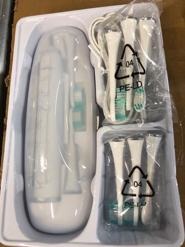 Photo 2 of Aquasonic Vibe Series Ultra Whitening Electric Toothbrush.