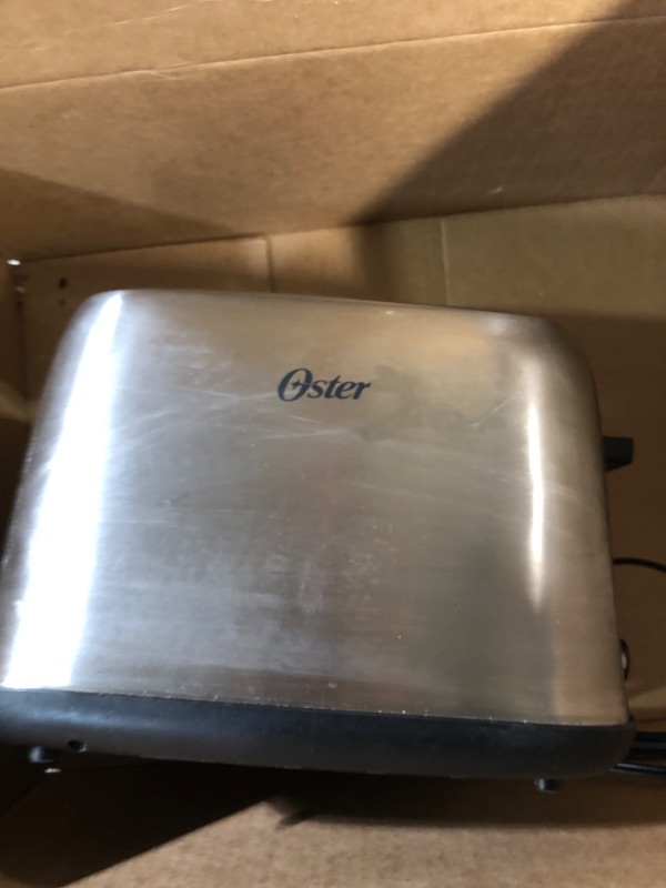 Photo 3 of -USED-Oster 2-Slice Toaster with Advanced Toast Technology, Stainless Steel
