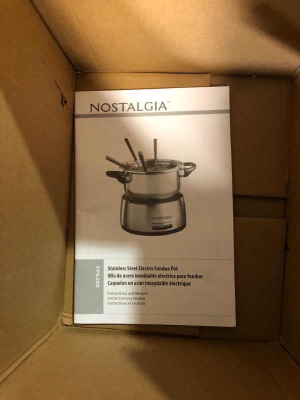 Photo 4 of [USED] Nostalgia 6-Cup Stainless Steel Electric Fondue Pot Set 