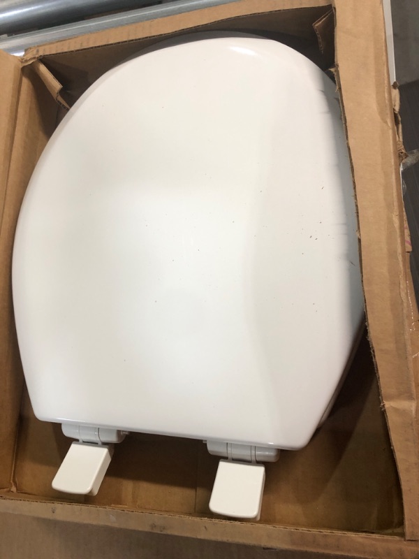 Photo 2 of -USED-MAYFAIR 888SLOW 000 NextStep2 Toilet Seat with Built-In Potty Training Seat, Slow-Close, Removable that will Never Loosen, ROUND, White Round White