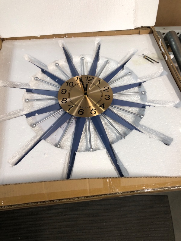 Photo 1 of  24 inch Mid Century Starburst Wall Clock, Battery Operated