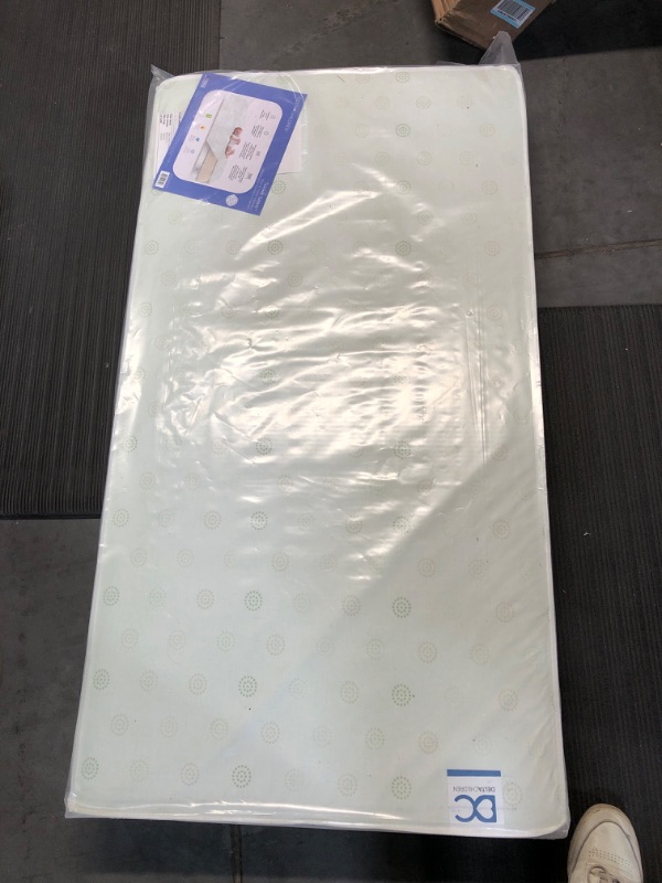 Photo 1 of Delta Children Twinkle Galaxy Dual Sided Crib and Toddler Mattress- Made in USA
