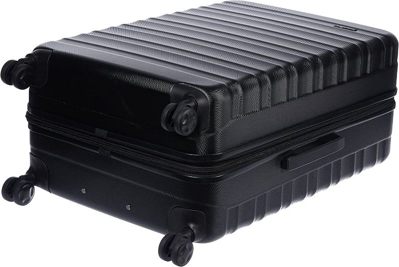 Photo 1 of Amazon Basics 30-Inch Hardside Spinner, Black