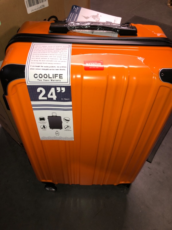 Photo 2 of  Suitcase Spinner 20in 24in 28in Carry on (orange new)
