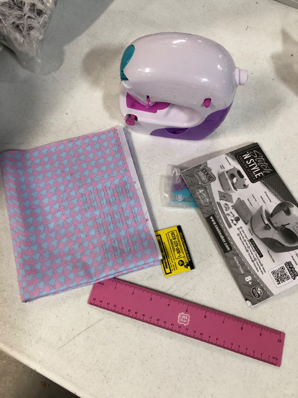 Photo 1 of Cool Maker, Stitch ‘N Style Fashion Studio, Pre-Threaded Sewing Machine Toy with Fabric and Water Transfer Prints, Arts & Crafts Kids Toys for Girls
