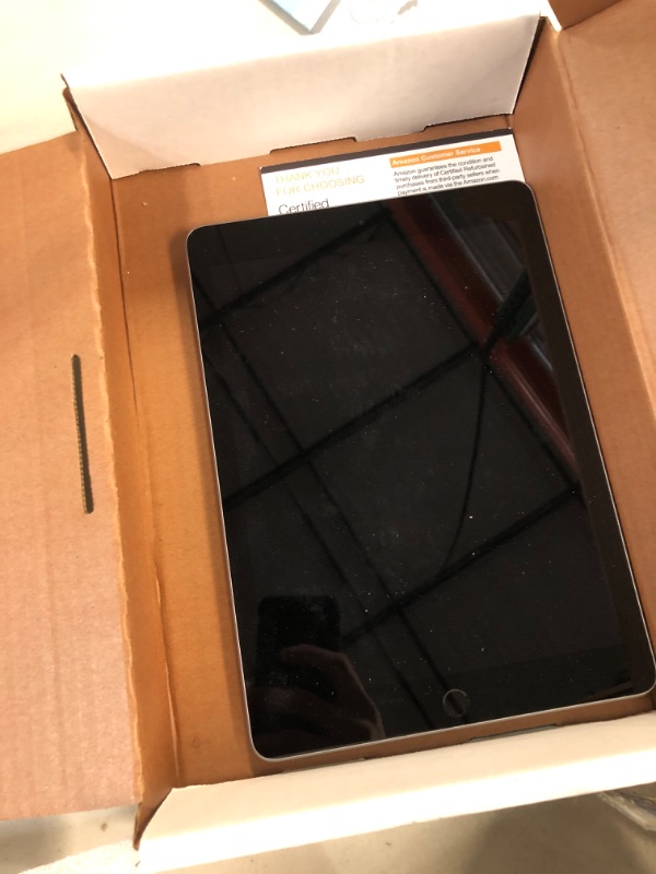 Photo 1 of **NEEDS A FACTORY RESET**
Apple iPad (2018 Model)