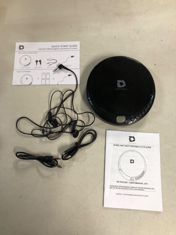 Photo 2 of Deluxe Products CD Player Portable with 60 Second Anti Skip, Stereo Earbuds, Includes Aux in Cable and AC USB Power Cable for use at Home or in Car