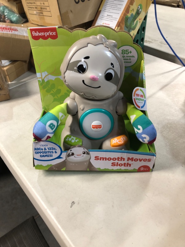 Photo 2 of Fisher-Price Linkimals Baby Learning Toy with Interactive Lights Music and Clapping Motion, Smooth Moves Sloth Standard Packaging
