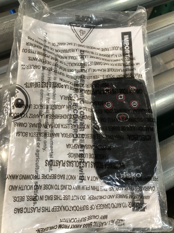 Photo 1 of *Used* Lasko Oscillating Digital Ceramic Tower Heater with Timer and Remote Control, 22.75 Inches, White, 5165