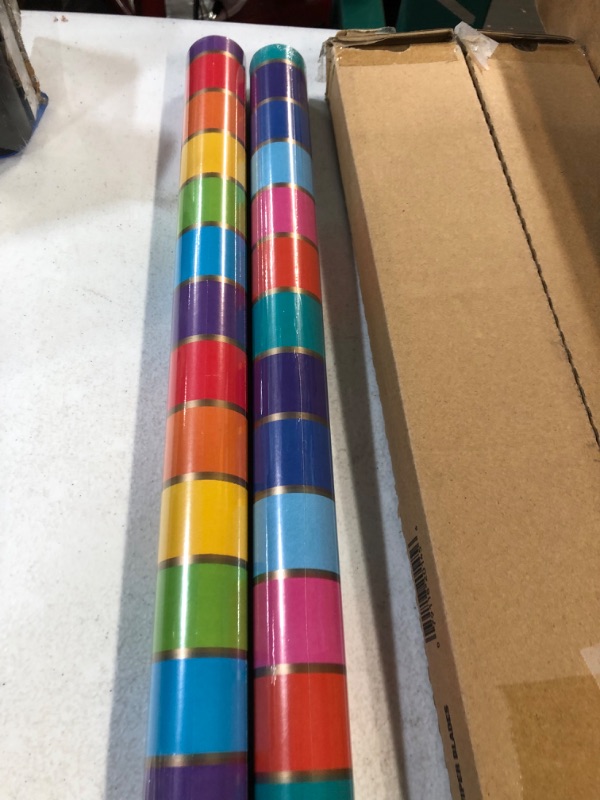 Photo 2 of **SEE NOTES**
Hallmark Reversible Rainbow Wrapping Paper (3 Rolls: 75 sq. ft. title) 