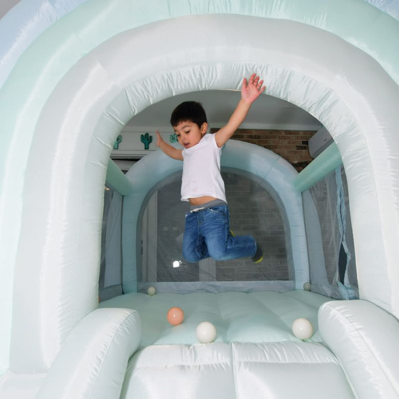 Photo 4 of Bounceland Daydreamer Mist Bounce House, 8.9 ft L x 7.2 ft W x 6.7 ft H, UL Blower Included, 30 Pastel Plastic Balls