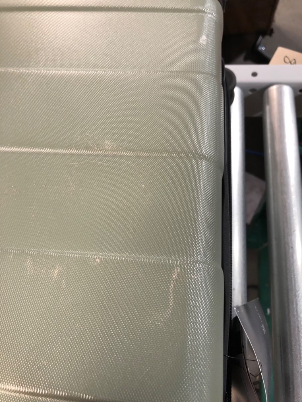 Photo 1 of **SLIGHTLY DIRTY**
Hardside Carry on Spinner Suitcase Green - Made by Design