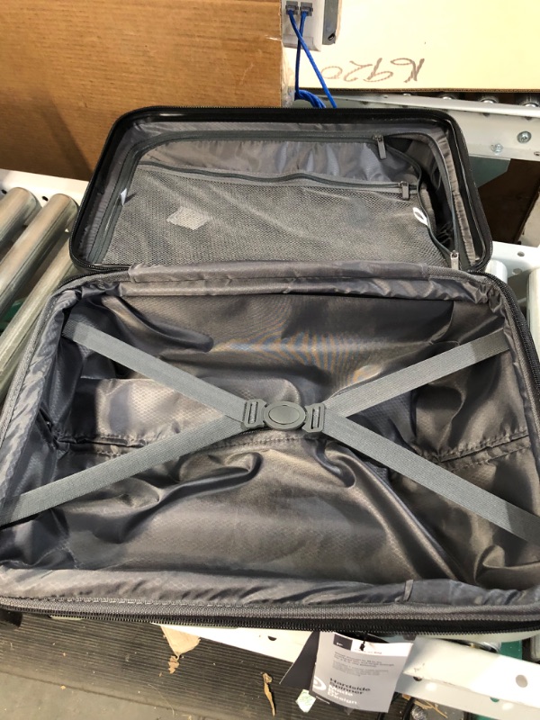 Photo 1 of **SLIGHTLY DIRTY**
Hardside Carry on Spinner Suitcase Green - Made by Design