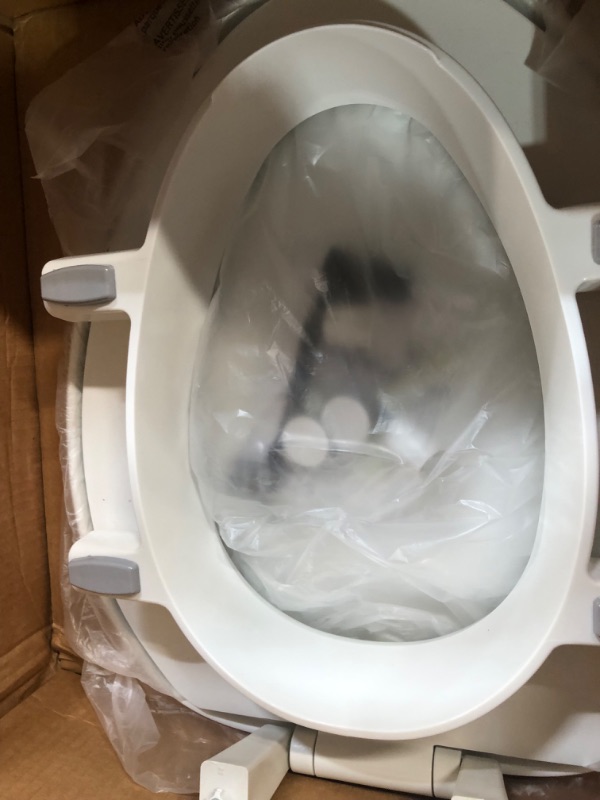 Photo 2 of  3" Raised Toilet Seat, White Elongated 