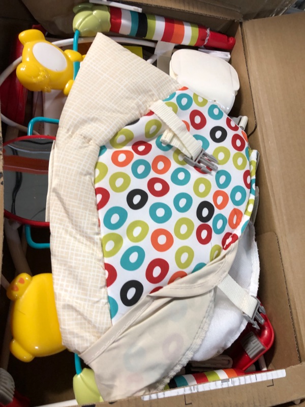 Photo 1 of Bright Starts Playful Pinwheels Portable Baby Bouncer  19.8x13.1x3.4 Inch, Age 0-6 Months