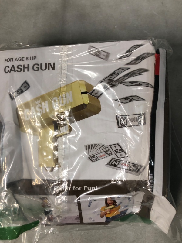Photo 1 of Gold Money Gun Shooter with 201 PCS Prop Money Fake Money, Make it Rain Paper Playing Spary Money Toy Gun