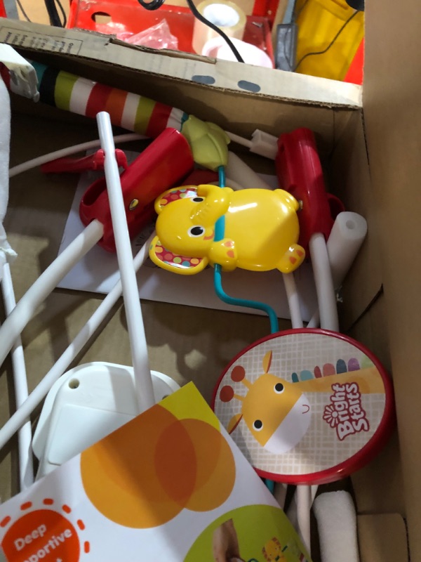 Photo 1 of Bright Starts Playful Pinwheels Portable Baby Bouncer with Vibrating Infant Seat and-Toy Bar, 19.8x13.1x3.4 Inch,