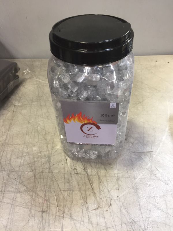 Photo 2 of Z Zennister Fire Pit Glass Rocks,  High Luster, 1/2" Reflective Tempered Fire Glass in Silver, 10 Pound Jar  for Natural or Propane Fireplace, Crushed Glass Stones for Firepit, Garden or Patio
