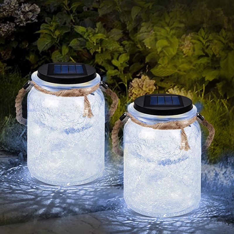 Photo 1 of  Greenidea 2 Pack Hanging Solar Lantern Lights ,Crackle Mason Jar Solar Lights Outdoor Decorative Waterproof Table Light for Patio Yard Lawn Tree ,White
