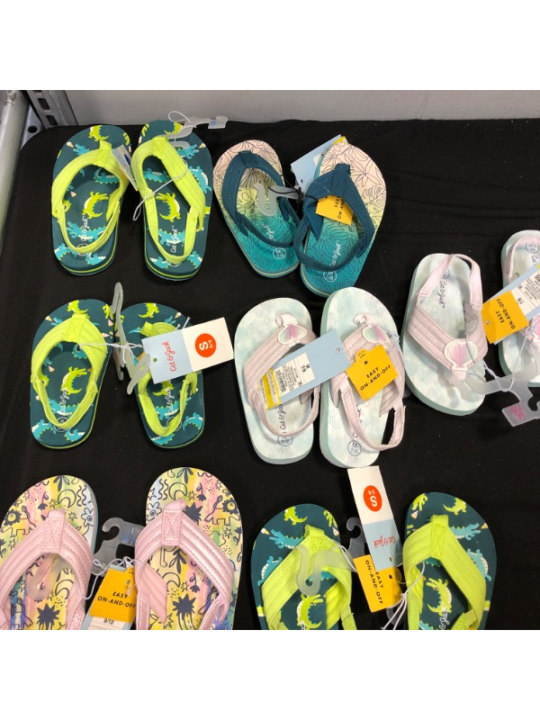 Photo 1 of ASSORTED KIDS FLIP FLOPS (7) VARIOUS SIZES