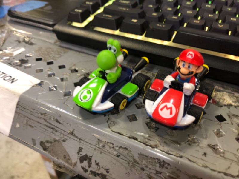 Photo 3 of Carrera First Mario Kart - Slot Car Race Track With Spinners - Includes 2 Cars: Mario and Yoshi - Battery-Powered Beginner Racing Set for Kids Ages 3 Years and Up
