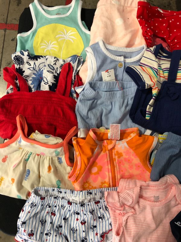 Photo 2 of Bundle of baby clothes sizes ranging from 6M-12M 