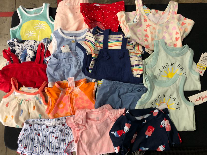 Photo 1 of Bundle of baby clothes sizes ranging from 6M-12M 