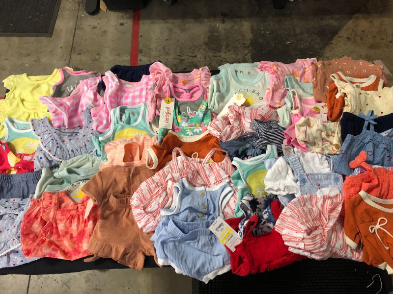 Photo 1 of Bundle of baby clothes sizes ranging from NB-3M