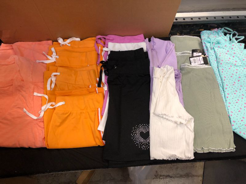 Photo 1 of BAG LOT OF SKIRTS/ TOPS ***MED**GIRLS