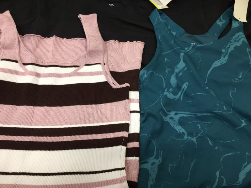 Photo 1 of BAG LOT OF MISC CLOTHES (XL)