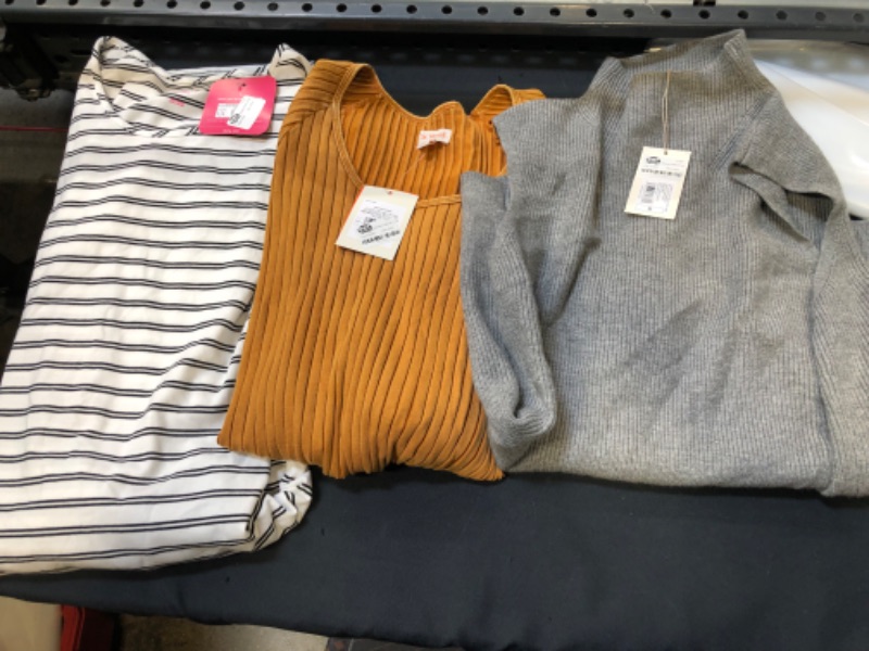 Photo 1 of BAG LOT MISC ITEMS CLOTHES SIZE SMALL AND LARGE