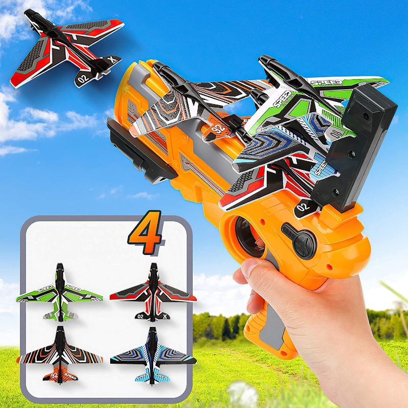 Photo 1 of Catapult airplane toy airplane, equipped with 4 airplanes, pistol shooting game toys, air combat glider airplane launcher, fun outdoor sports toys, the best choice for birthday parties (yellow suit)
