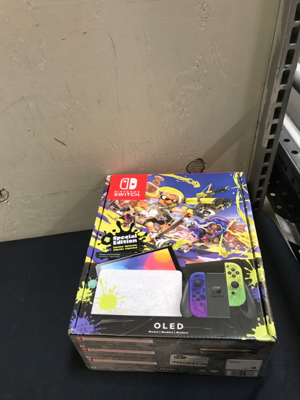 Photo 2 of Nintendo Switch – OLED Model Splatoon 3 Special Edition
(TURNS ON BUT UNABLE TO TEST FULLY IN FACILITIES)