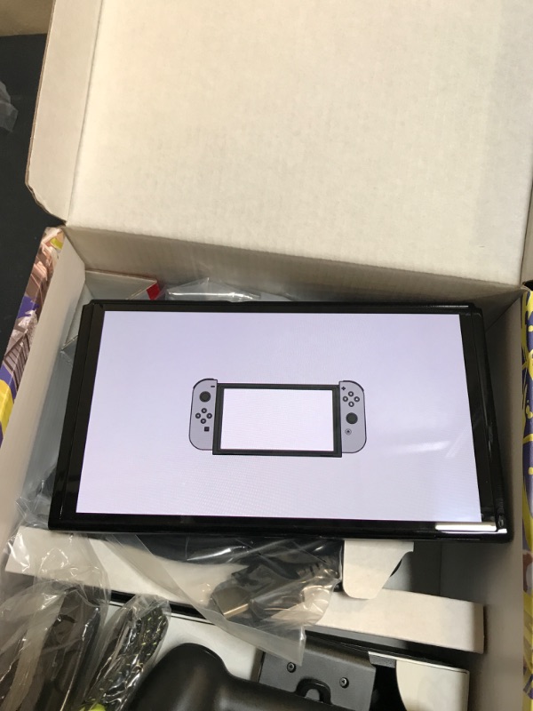 Photo 4 of Nintendo Switch – OLED Model Splatoon 3 Special Edition
(TURNS ON BUT UNABLE TO TEST FULLY IN FACILITIES)