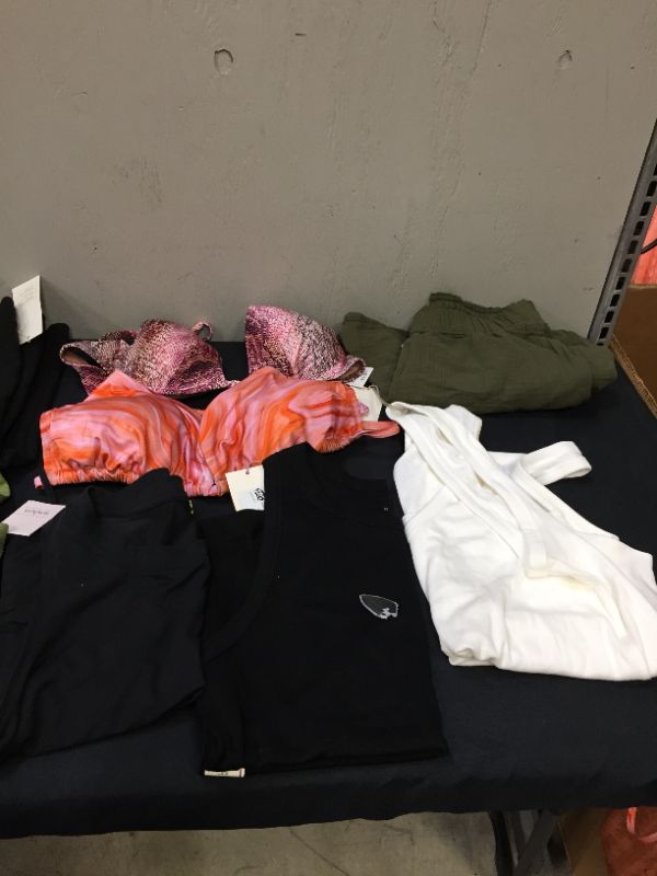 Photo 1 of BAG LOT OF WOMENS CLOTHING "DIFFERENT STYLES ANS SIZES" --SOLD AS IS ----